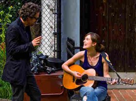 After hearing Greta singing in a New York City bar, Dan, a record label executive played by Mark Ruffalo in Begin Again, helps her record her first big album.
