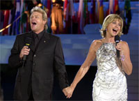 John Farnham and Olivia Newton-John welcome the athletes at the Opening Ceremony of the Sydney 2000 Olympic Games